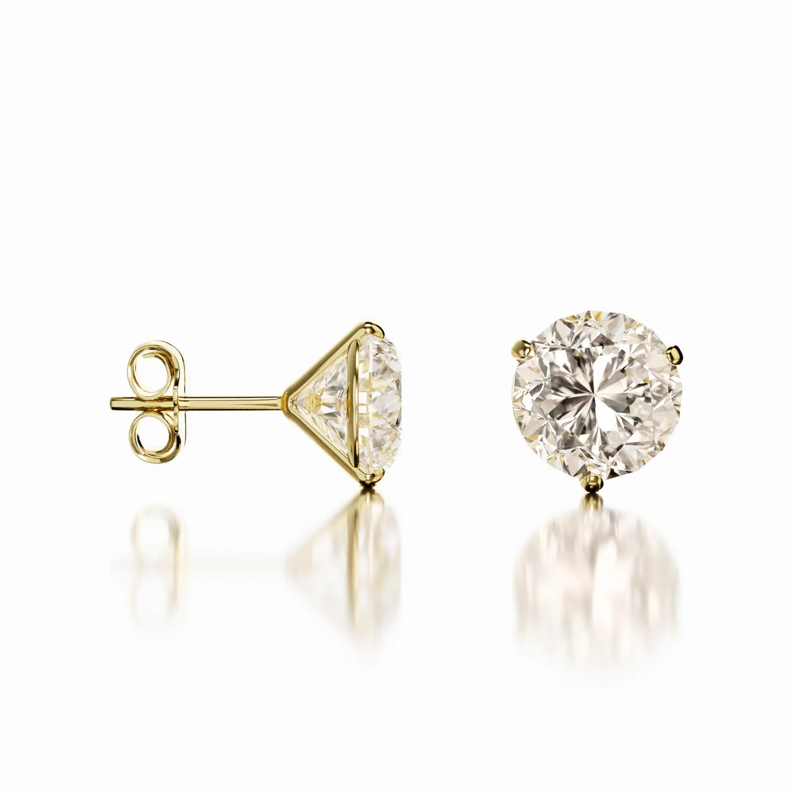 Gold martini stud earrings featuring round-cut moissanite stones in a sleek 3-prong setting, showcasing their brilliance and minimalist design